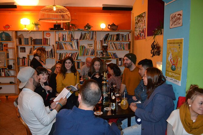 Alternative bar tour with dinner in the art district - Tram to Holesovice: switching from story to sound
