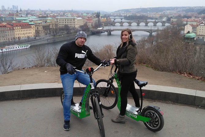 Best Prague Viewpoints: Guided E-Scooter Tour - Lennon Wall, signing the moment, and a wide view over the city