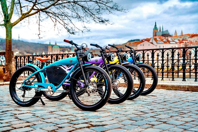 E-BIKE TOUR: 10 Must-See Landmarks & Viewpoints in Prague 1-8per. - Charles Bridge and the river start: the classic postcard moment