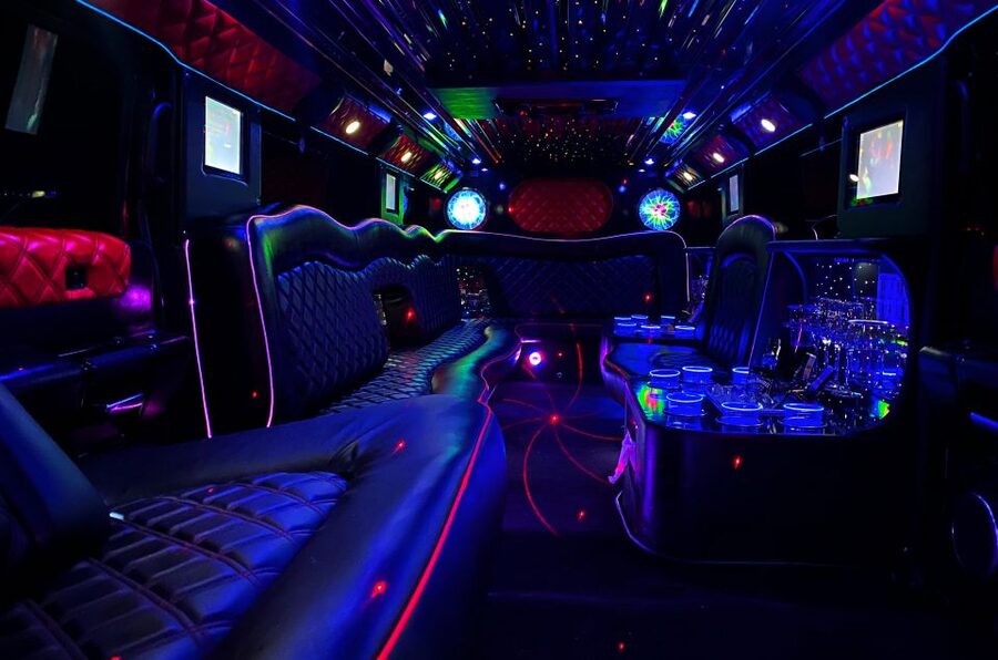 Long Hummer or Cadillac Limousine Party Ride - Your 1-Hour Party Ride: Beer, Champagne, And A Chauffeur Who Handles It