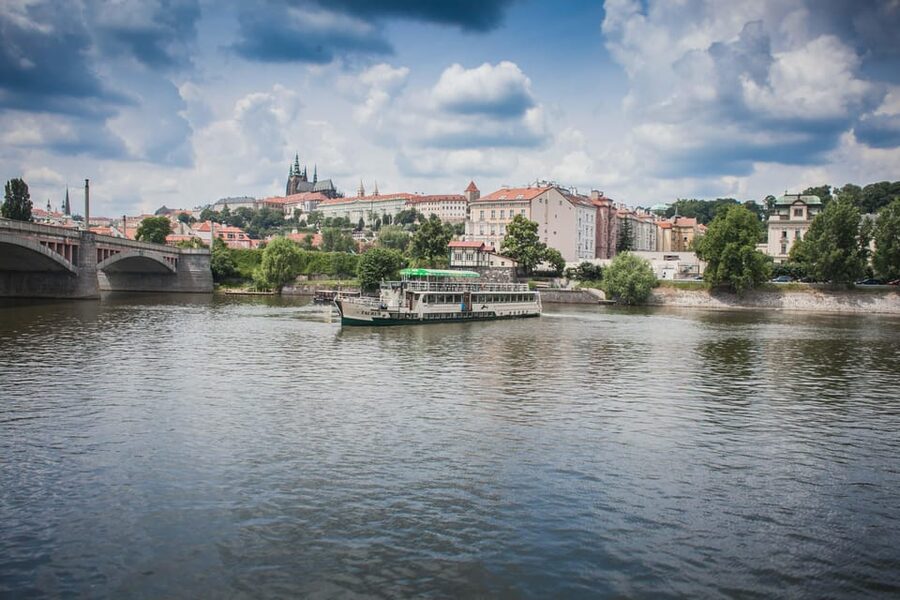 Prague: An unforgettable 2-hour cruise on the Vltava River. - The Dancing House contrast: modern lines beside classic Prague