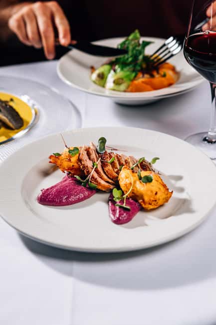 Prague:Breathtaking Cabaret Show with 4-Course Dinner Option - The Cabaret Show: Singing, Dancing, and Stunt Moments