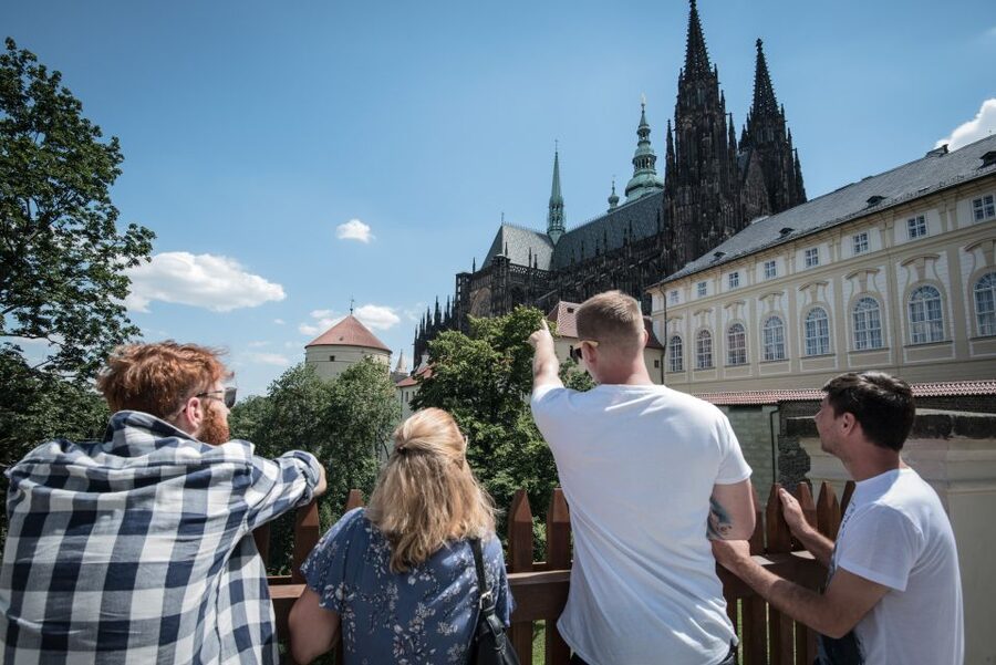 Prague: Castle Grounds & Highlights Walking Tour small-group - St. Vitus Cathedral: tall towers, ornate details, and a reality check