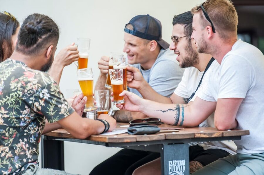 Prague: Castle Side Breweries & Pubs Guided Walking Tour - The hill game: tram ticket included