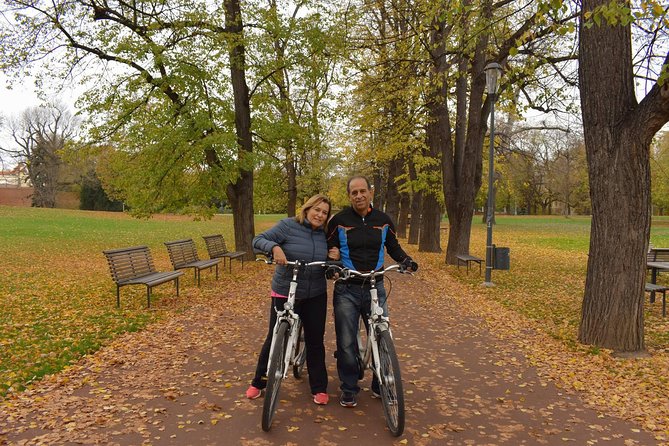 Prague E-Bike City Tour with A Local Guide - Lennon Wall, National Theatre riverside views, and the Wenceslas Square outlook