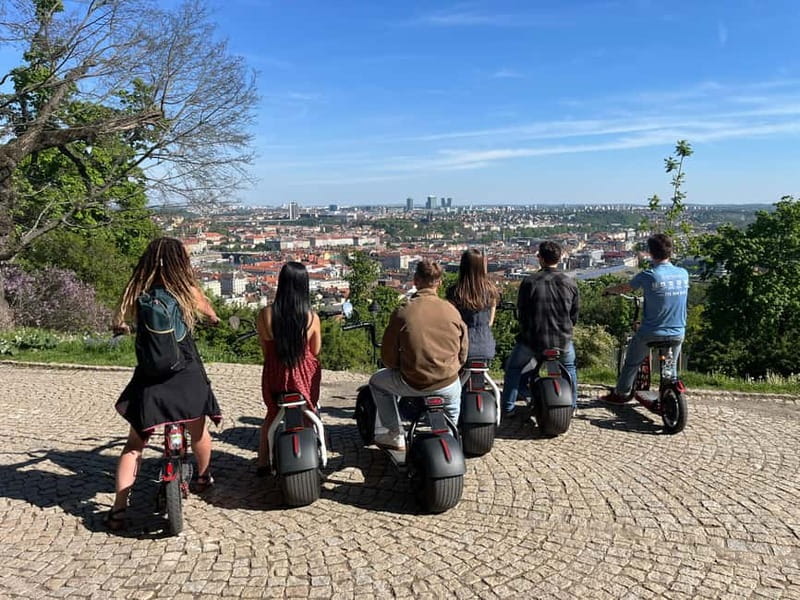 Prague E-Scooter City Tour: Regular or Fat Tire - John Lennon Wall, St. Nicholas, and Prague Castle Without the Stair Workout