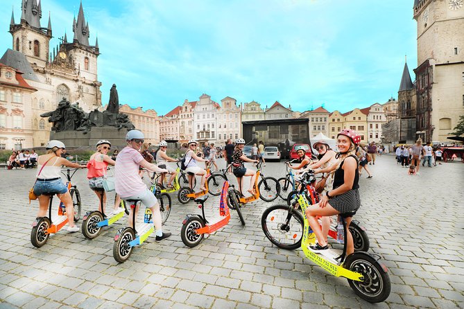 Prague: electric scooter & E-bike guided tour - Prague Castle gate, Strahov monastery, and Petrin Hill on longer options
