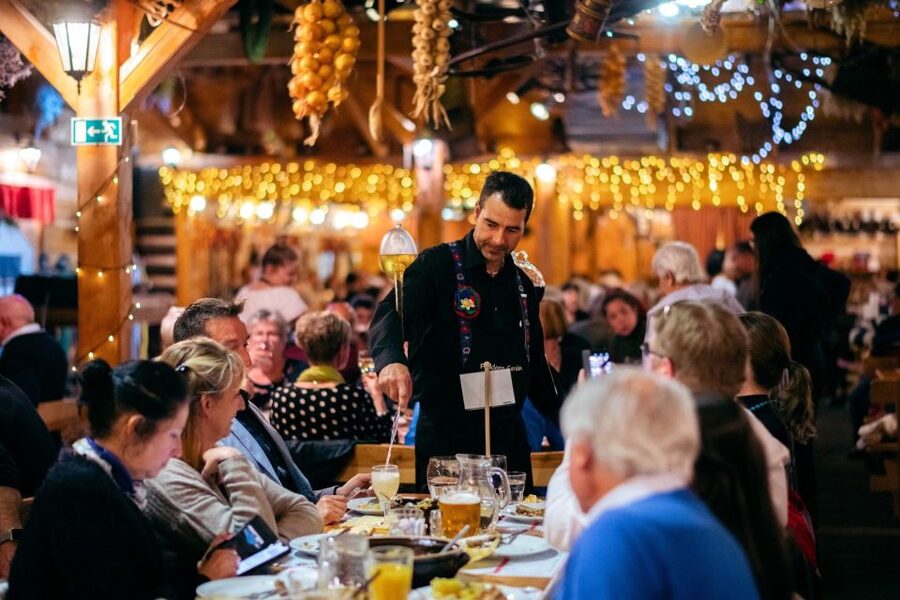 Prague: Evening Folklore Garden Party with Traditional Menu - The 2.5-hour performance: folk music, dance lessons, and audience games
