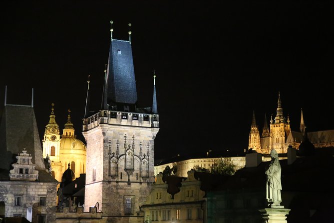 Prague evening/lights tour by car - Stop 1: Prague Castle terrace at night, with a city-center glow