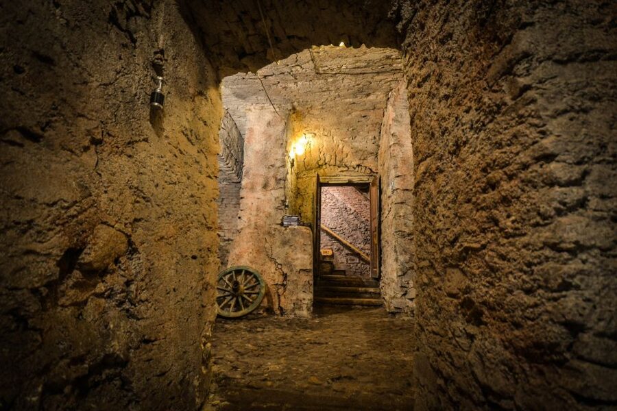 Prague: Ghosts, Legends, Medieval Underground & Dungeon Tour - The Dungeon by candle light: execution history and torture instruments
