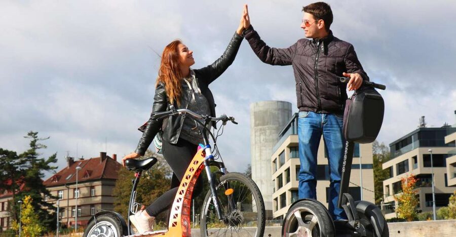 Prague: Grand Segway and eScooter Live Guided City Tour - Statues, stadium grounds, and the final Castle District wander