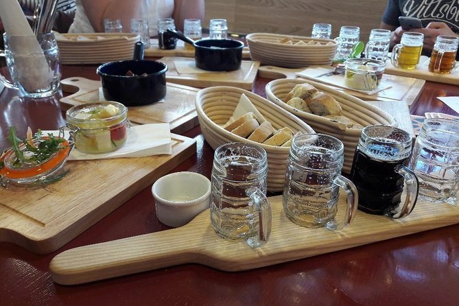 Prague Mini-Breweries Beer Tour with Czech Appetizers - Dvořákovo nábřeží and the last stop: unlimited beer plus food