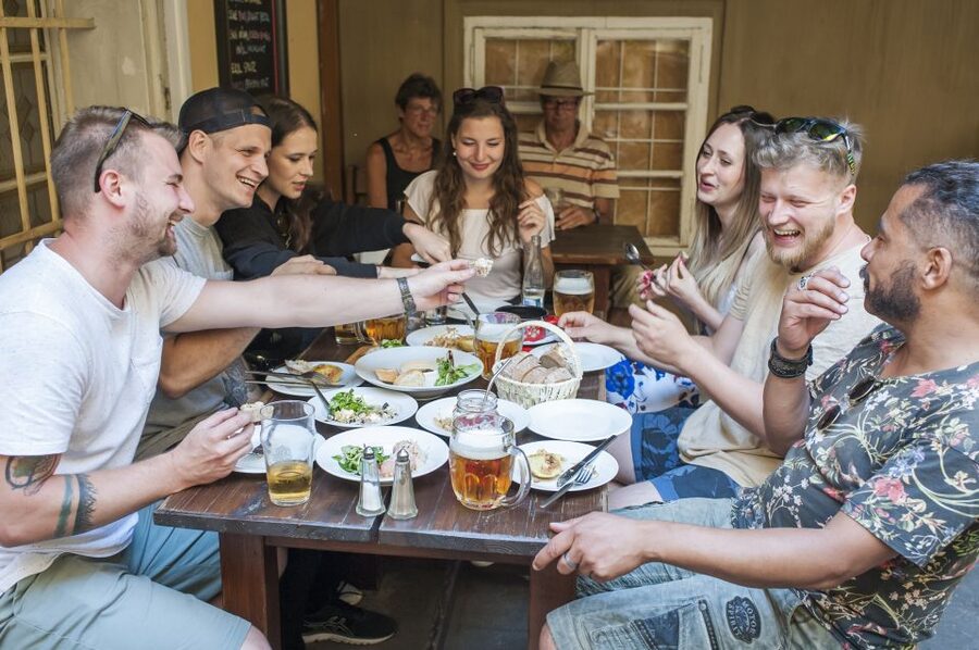 Prague: One Prague Tour with Local Food & Beer - The tour format: a guided walk with beer and one Czech food stop
