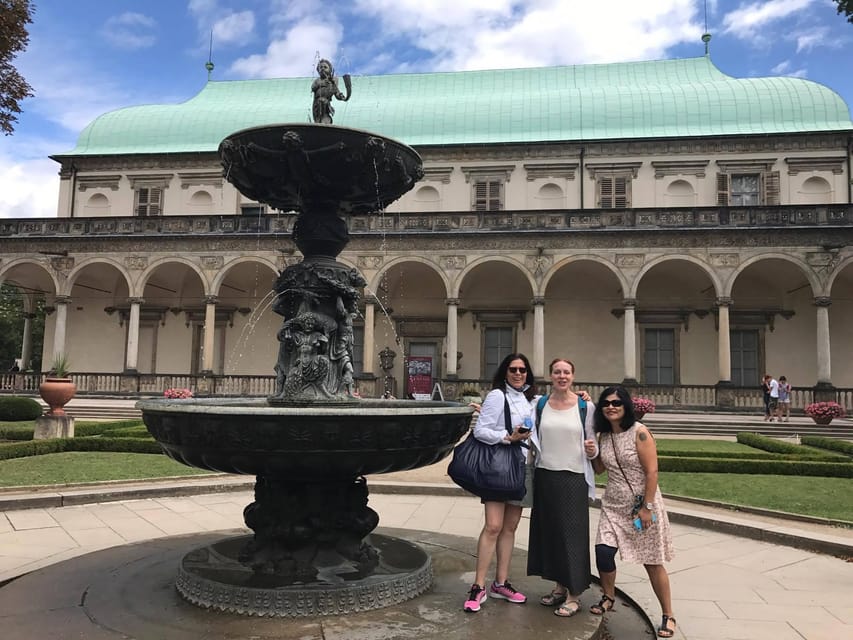 Prague Renaissance and Baroque Gardens Walking Tour - Crossing through the castle grounds: stag moat, courtyards, and stairs