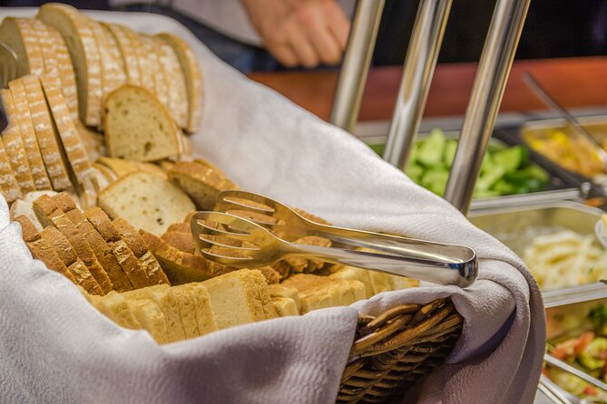 Prague: Sightseeing Boat Cruise with Buffet Dinner - Price and value: what you get for about $61