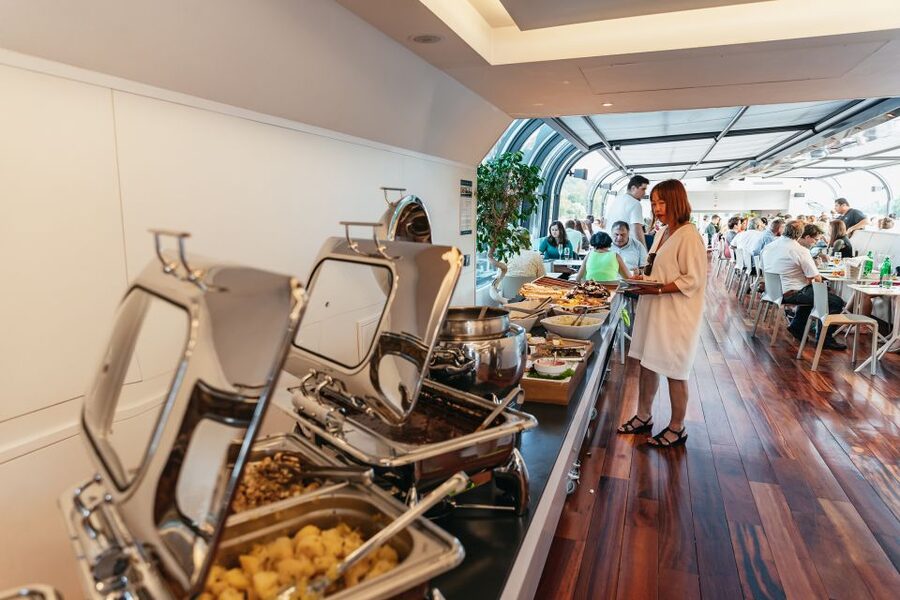 Prague: Sightseeing Dinner Cruise on Open-Top Glass Boat - Dinner onboard: buffet style, Czech plus international, and how to manage the flow