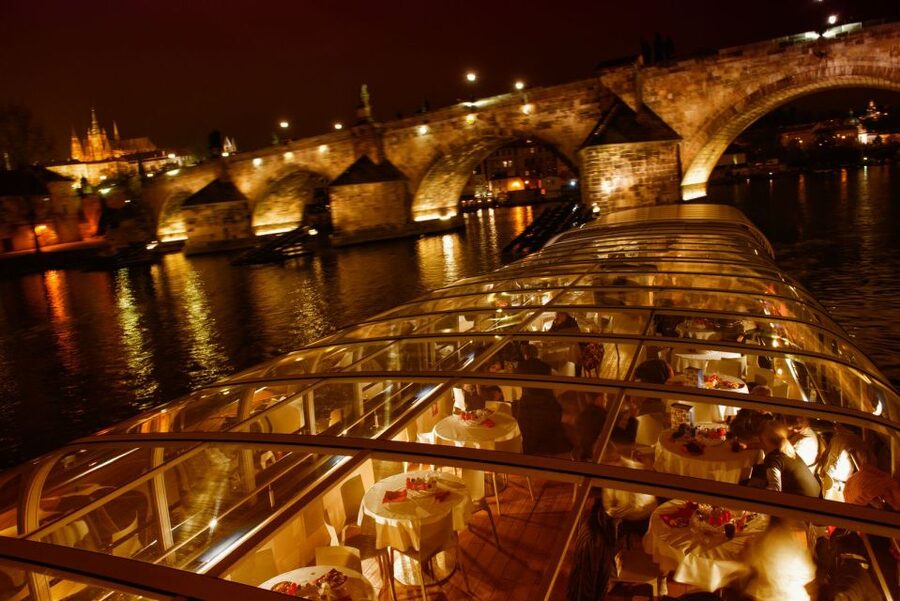 Prague: Sightseeing Dinner Cruise on Open-Top Glass Boat - Practical tips: what to wear, when to go outside, and how to use the maps