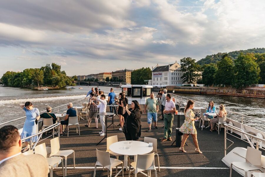 Prague: Sightseeing Dinner Cruise on Open-Top Glass Boat - The boat setup: insulated deck, retractable glass, and real photo time