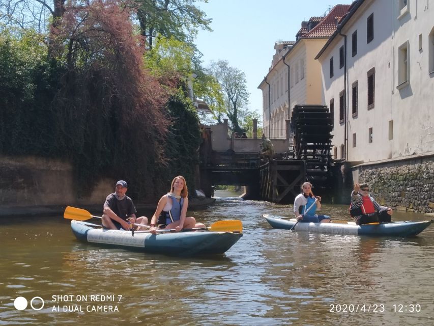 Prague: Vltava River Guided Canoeing Tour - Dancing House, arches, and National Theatre views, all from water level