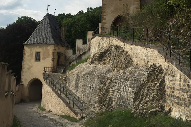 Private Karlstejn castle trip from Prague with Lunch & Admission - Arriving at the castle grounds: courtyards, legends, and the uphill reality