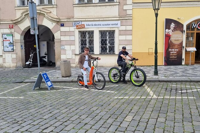 Scenic Panoramic views e-Scooter/ eBike Guided Tour of Prague - Stop 1 to 5, the riverfront start, Lennonova zed, and Kampa views